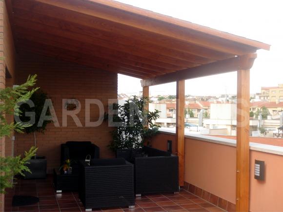 Porche de madera a un agua adosado a la vivienda